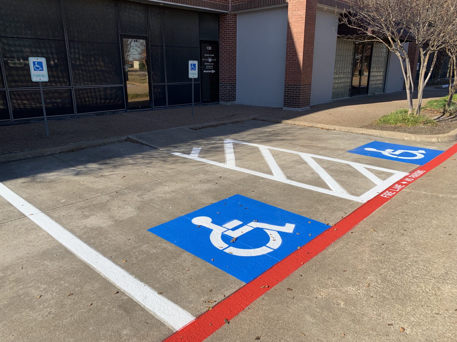 Handicap Painting Parking Lot Ada Compliance Feature Image