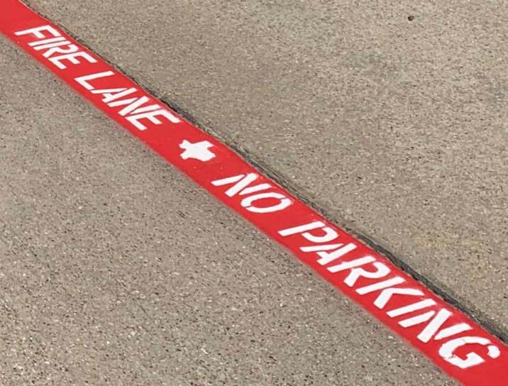 Parking Lot Striping pressure washing parking lot maintenance