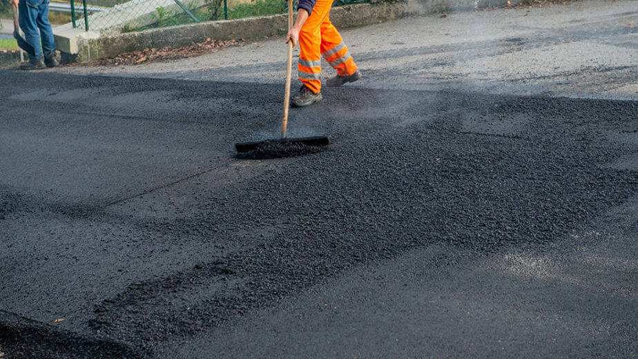 Laying new asphalt on disconnected road