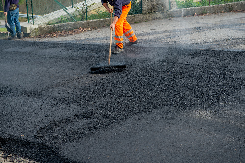 Laying new asphalt on disconnected road